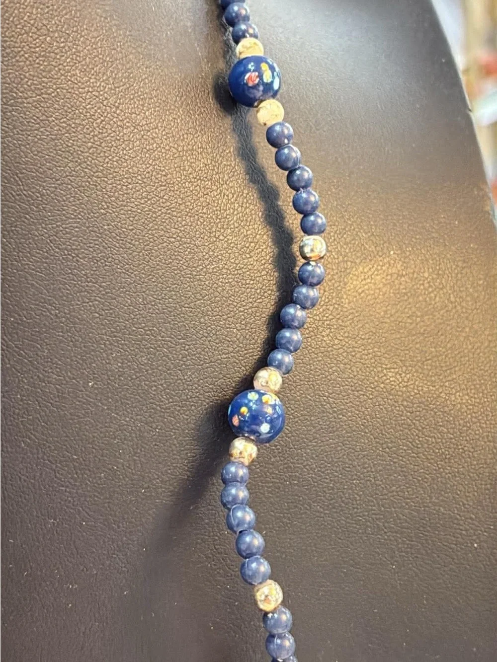 Handcrafted Navy Blue Beaded Bracelet with floral Accents